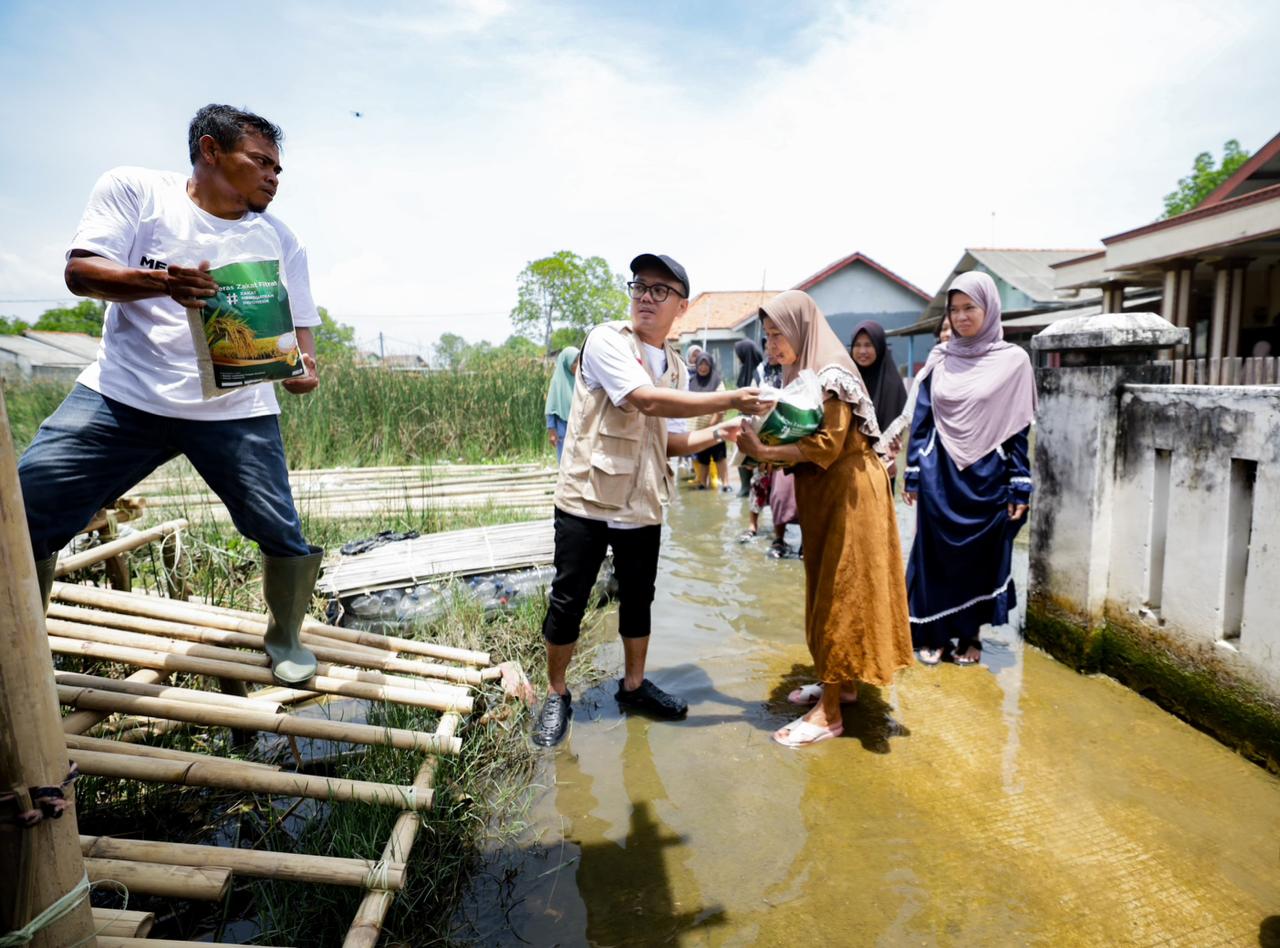 bantuan_banjir_rob.jpg